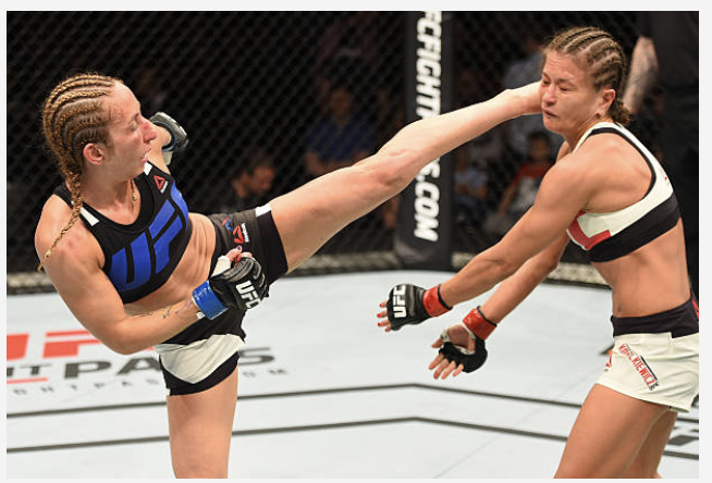 Heather Jo Clark throwing a high kick in a UFC bout